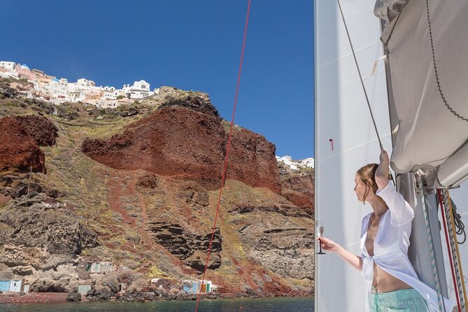 Premium Small-Group Catamaran Cruise with BBQ, Open Bar, Transfer - Red Beach, White Beach, and Mesa Pigadia