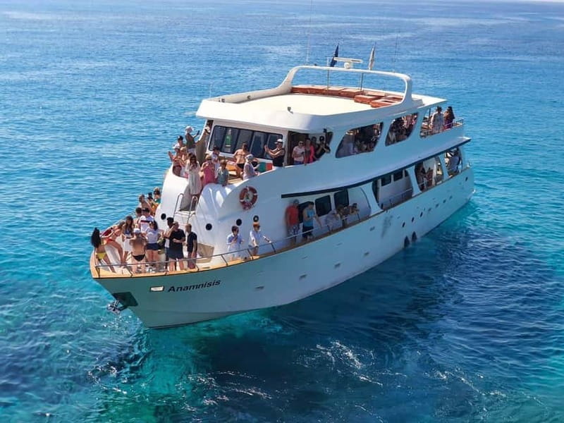 Protaras: Luxury Yacht Cruise with slide, BBQ Lunch & Drink - The Blue Lagoon lunch and swimming stop