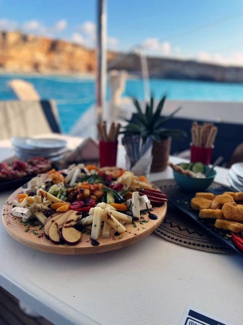 Rethymno: Sunset Catamaran Cruise - Sushi & Open Bar - Sunset near the Cretan coast
