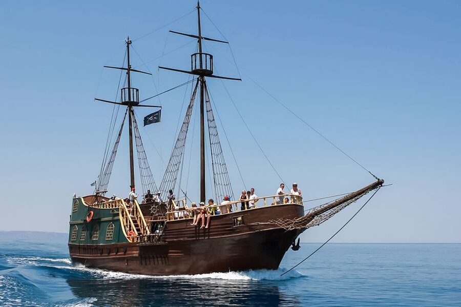 Rethymno: Sunset Cruise on a Wooden Pirate Boat - Sunset over the Cretan mountains