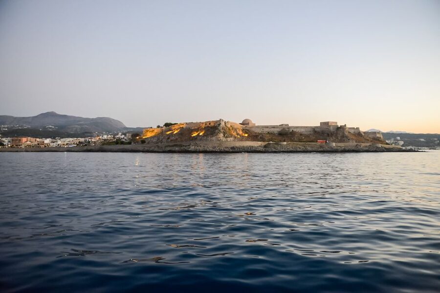 Rethymno: Sunset Cruise on a Wooden Pirate Boat - Returning with Rethymno lit up