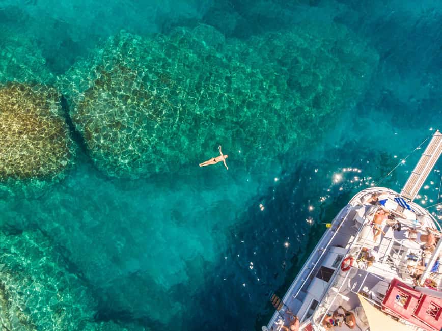 Rhodes: Boat Tour with Snorkeling, Gourmet Buffet & Open Bar - Cruising south toward Afandou Beach