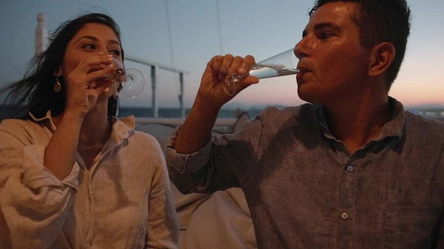 Rhodes: Sunset Cruise with Open Bar, Dinner, & Live Music - Sunset, moonrise, and the music on the way back