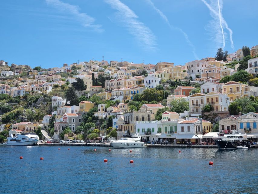 Rhodes: Symi Yacht Tour with Unlimited Drinks and Transfer - Symi Town gives you two hours ashore