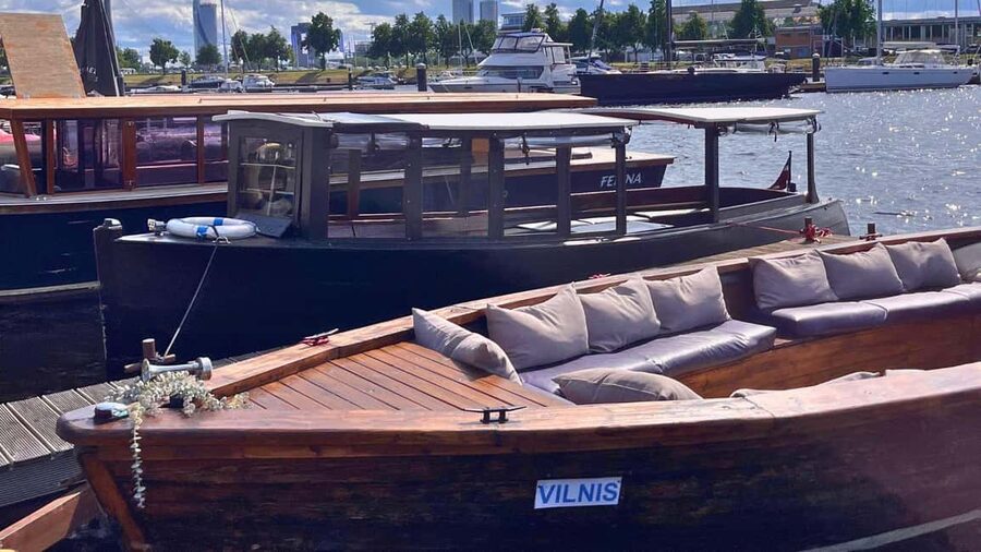 Riga: Canal Boat Tour with Welcome Drink & Audio Guide - Through the Riga Canal and its green central parks
