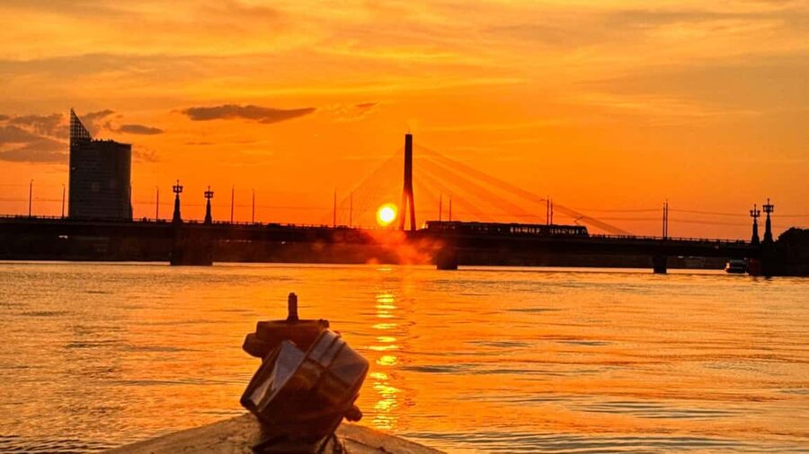 Riga: Canal Boat Tour with Welcome Drink & Audio Guide - The audio guide, seating, and sound