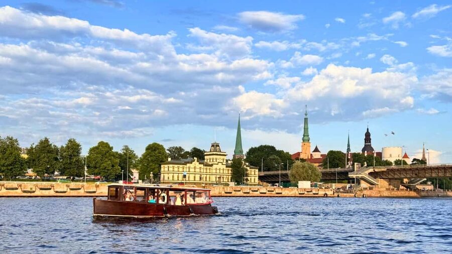 Riga: Canal Boat Tour with Welcome Drink & Audio Guide - Starting at Andrejosta, away from the postcard center