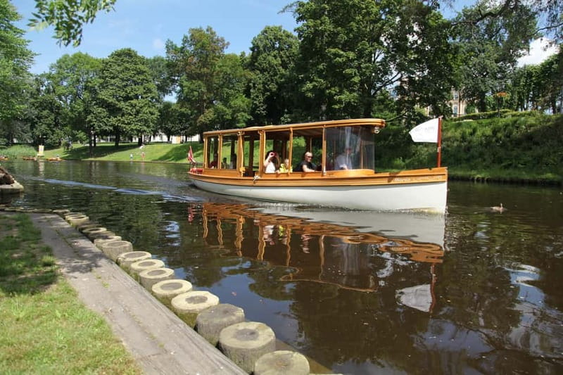 Riga: Canal & Daugava Cruise on a Historic Wooden Boat - Through the canal, parks, and historic bridges