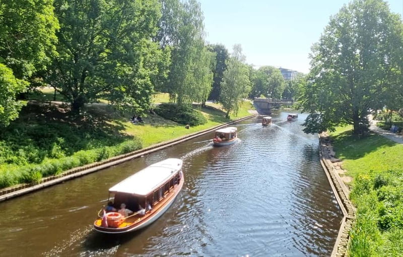 Riga: Canal & Daugava Cruise on a Historic Wooden Boat - Out onto the broad Daugava River