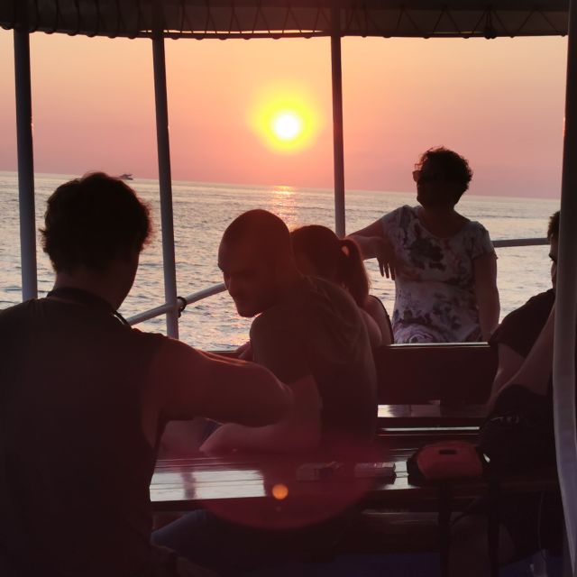 Rovinj: Sunset Boat Trip with Dolphin Watching - Passing Rovinj Island and the nearby islets