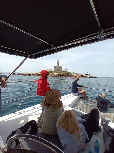 Rovinj: Sunset & dolphin group tours with Catamaran - Languages, timing, and booking flexibility