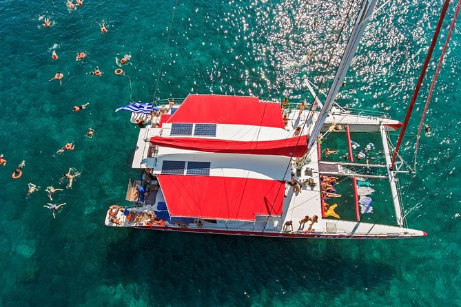 Sailing Catamaran Cruise in Santorini with BBQ, Drinks and Transfer - Seeing Santorini from the Aegean