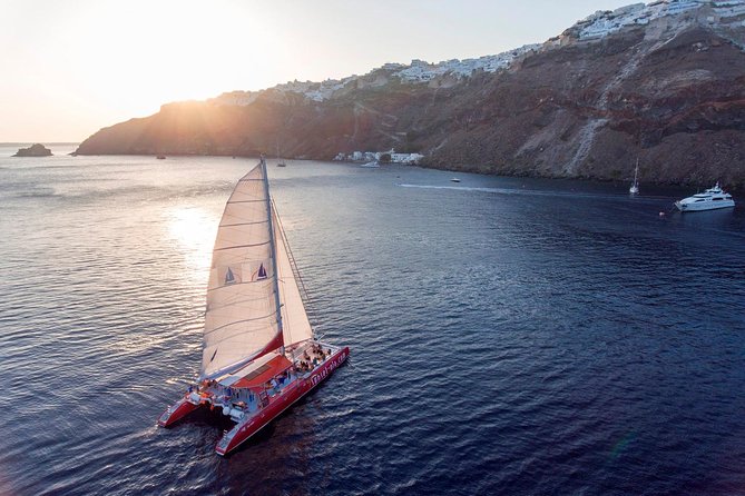 Sailing Catamaran Cruise in Santorini with BBQ, Drinks and Transfer - What the boat ride is really like