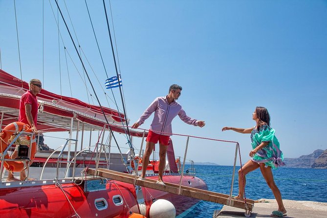 Sailing Catamaran Cruise in Santorini with BBQ, Drinks and Transfer - Booking details and cancellation