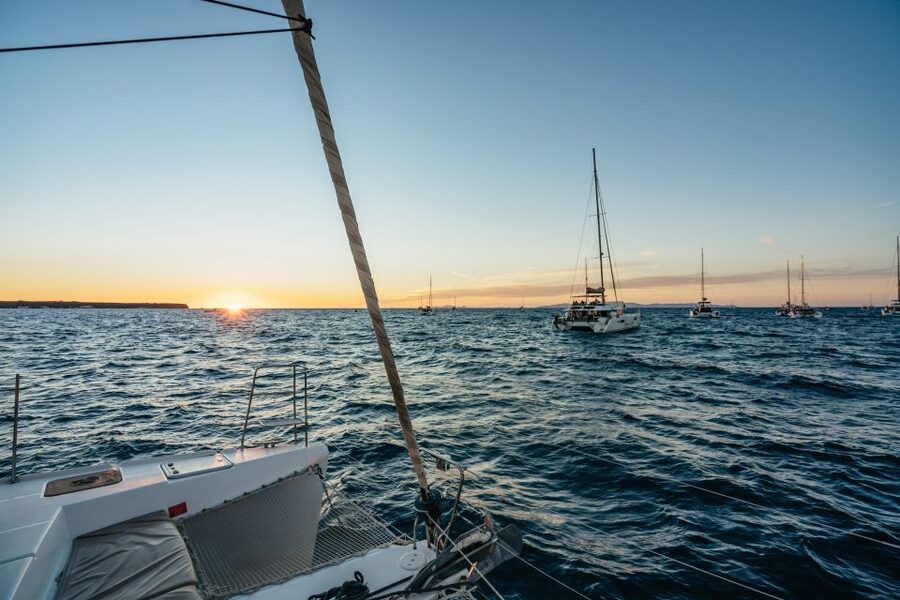 Santorini: Catamaran Caldera Cruise with Meal and Drinks - Aspronisi and the southern coast