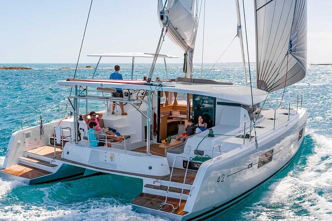 Santorini Catamaran Cruise with Greek Meal, Open-Bar and Sunset - Why Santorini looks different from a catamaran