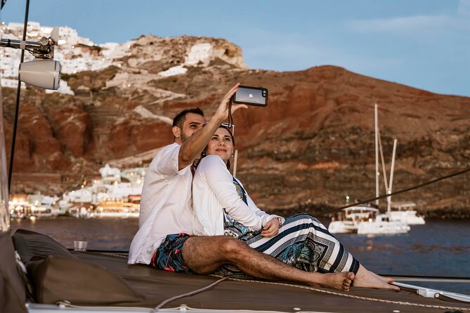 Santorini Catamaran Cruise with Greek Meal, Open-Bar and Sunset - Pickup details that can affect your day