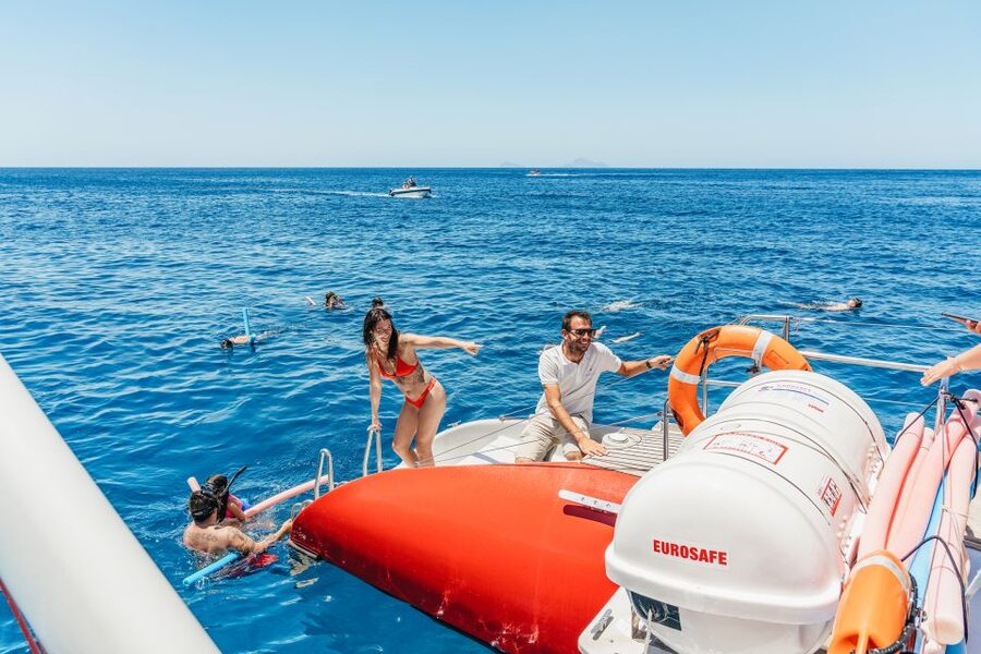 Santorini: Catamaran Tour with BBQ Dinner, Drinks, and Music - Key points at a glance