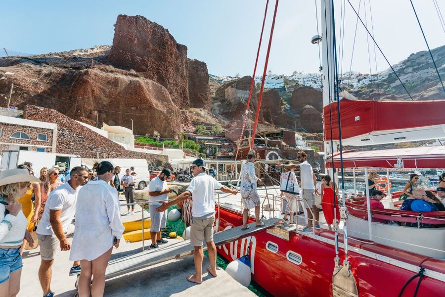 Santorini: Catamaran Tour with BBQ Dinner, Drinks, and Music - The BBQ meal and drink service