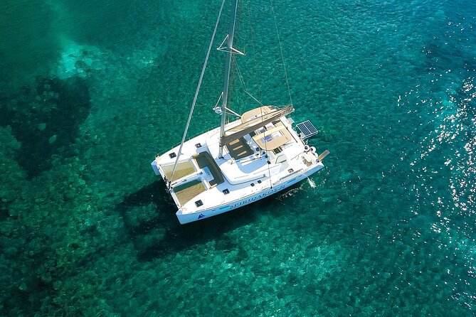 Santorini Classic Catamaran Cruise with BBQ, Drinks and Transfers - Palea Kameni and the swim to the hot springs
