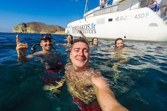 Santorini Classic Catamaran Cruise with BBQ, Drinks and Transfers - Food, crew, and the feel onboard