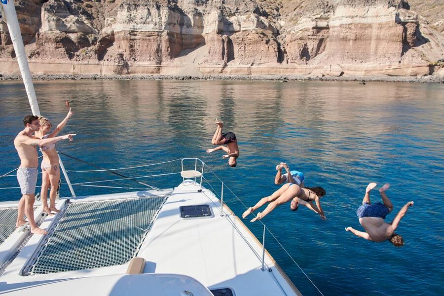 Santorini Gold Catamaran Cruise with Snorkel, BBQ & Open Bar - Why seeing Santorini from the sea changes the day