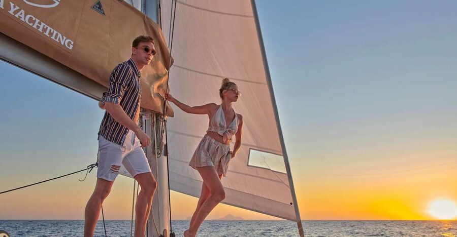 Santorini Gold Catamaran Cruise with Snorkel, BBQ & Open Bar - Leaving Vlychada Marina with lunch already in sight