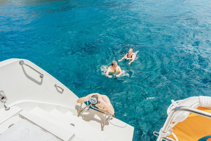 Santorini: Luxury Catamaran Day Trip with Meal and Open Bar - Who should book this catamaran cruise?