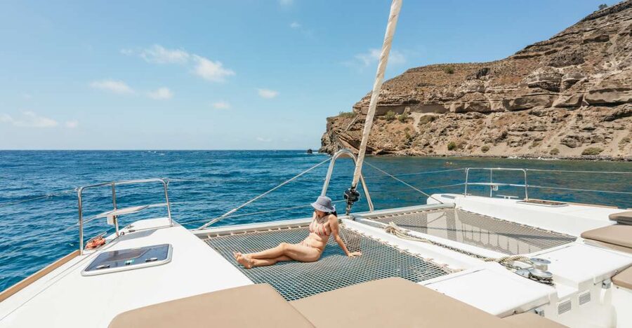 Santorini: Luxury Catamaran Day Trip with Meal and Open Bar - Red Beach and White Beach from the water