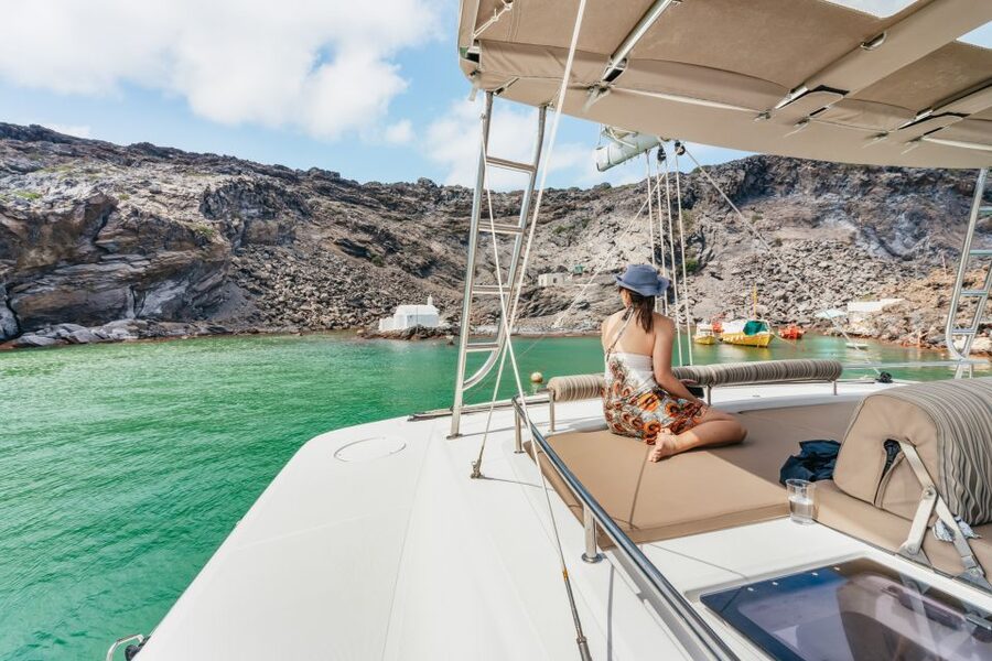 Santorini: Luxury Catamaran Day Trip with Meal and Open Bar - A Greek barbecue with wine, beer, and a cocktail