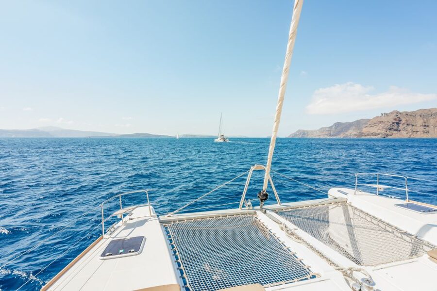 Santorini: Luxury Catamaran Day Trip with Meal and Open Bar - Pickup, port transfer, and boarding