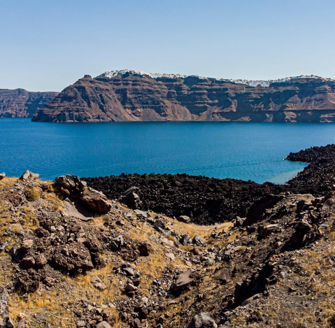 Santorini Port: 3 Hour Cruise to Volcano and Hot Springs - Nea Kameni: a rough walk across volcanic ground