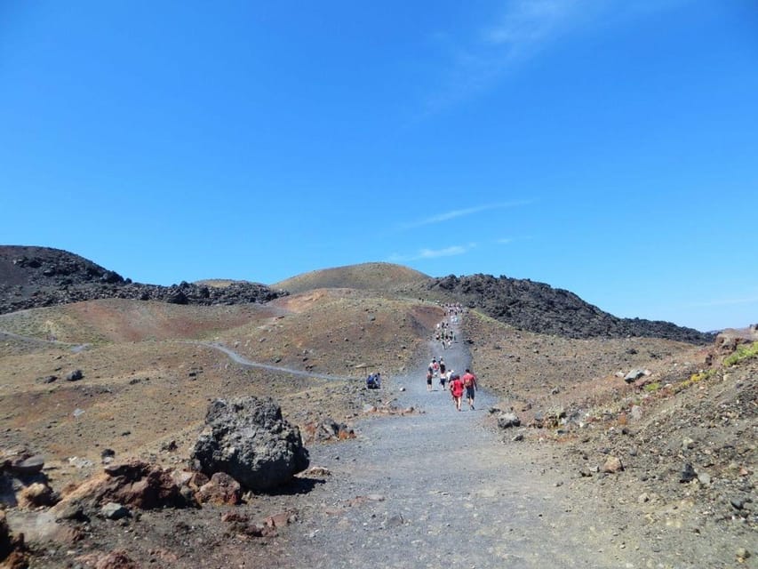 Santorini Port: Cruise to Volcano, Hot Springs & Thirassia - The return sail past Oia and Fira