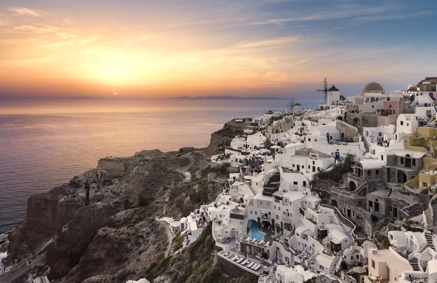 Santorini: Romantic Sunset Caldera Cruise with Dinner - Finding the sunset viewpoint on the Aegean