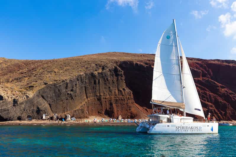 Santorini: Sailing Catamaran Cruise with BBQ and Drinks - Red Beach and the southern coast