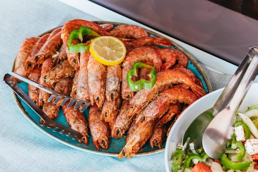 Santorini: Sailing Catamaran Cruise with BBQ and Drinks - Mesa Pigadia, lunch, and the longest stop