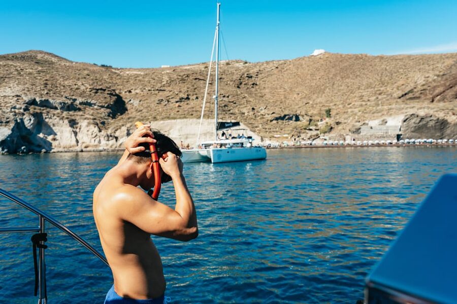 Santorini: Sailing Catamaran Cruise with BBQ and Drinks - Pickup, ports, and the details that can trip you up