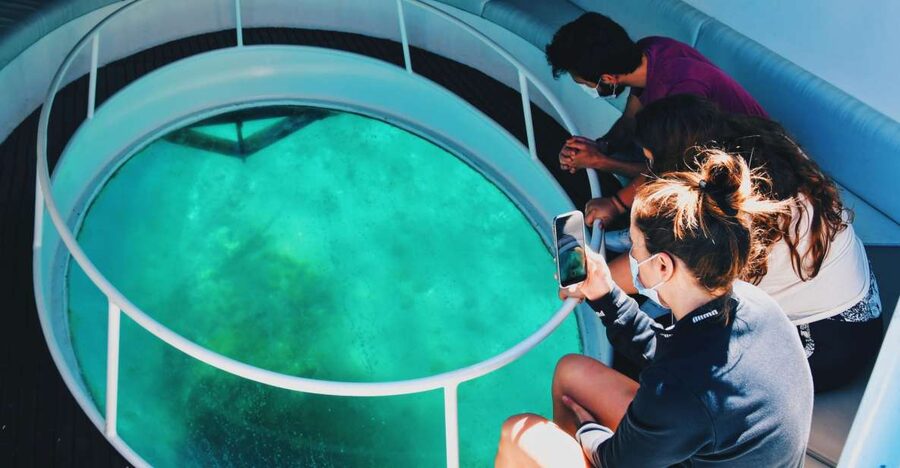 São Miguel: Glass Bottom Boat Tour with Snorkeling - Cruising around Ilhéu de Vila Franca do Campo