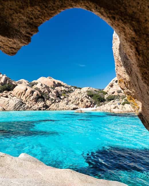 Sardegna: Tavolara Boat Tour with Snorkeling - Ulisse Ear Cave and the cliffside views