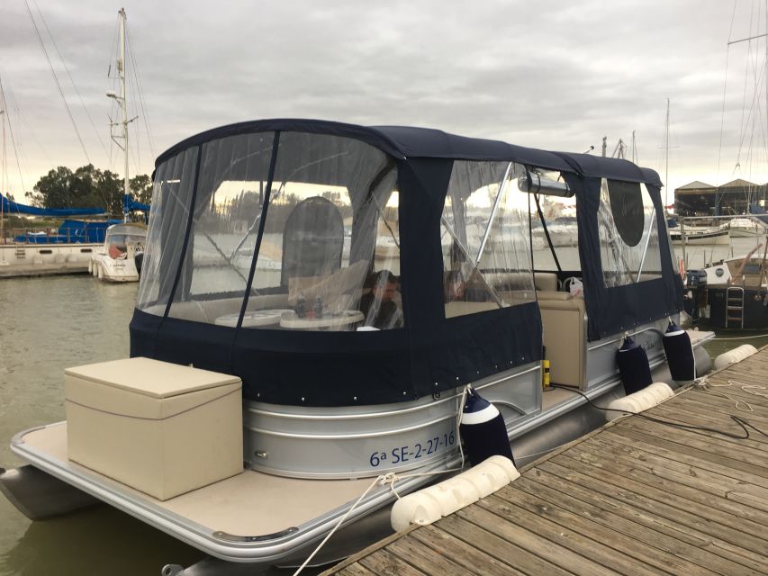 Seville: Exclusive River Boat Tour with Tapas - Why the small boat matters