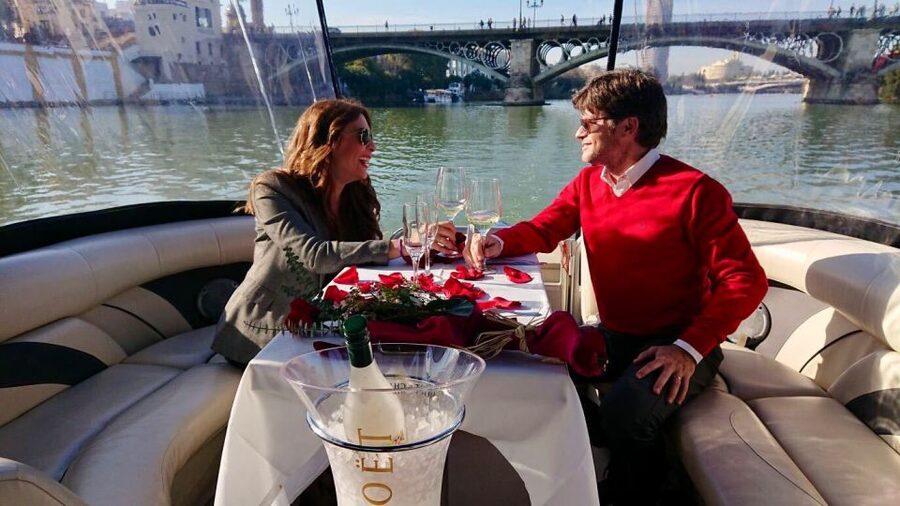 Seville: Exclusive River Boat Tour with Tapas - La Cartuja and the modern side of Seville