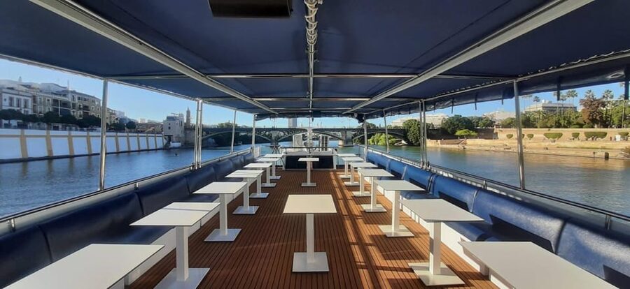 Seville: Guadalquivir Boat Tour with Optional Lunch/Dinner - Boat comfort and group size