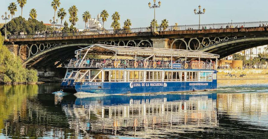 Seville: Guadalquivir River Cruise - Passing Triana and the 1852 bridge