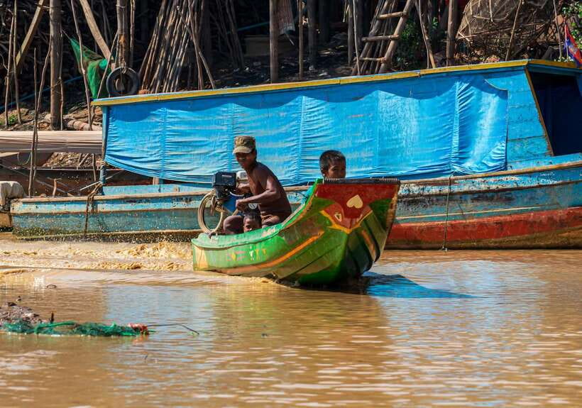 Siem Reap Floating Village Kampong Phluk Sunset with Boat - Walking through a working village