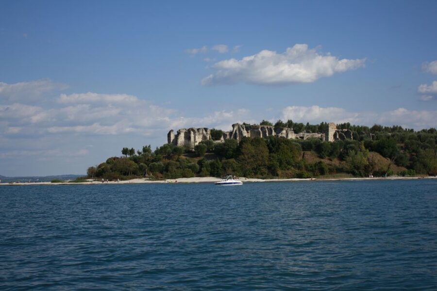 Sirmione: 25 Minute Boat Cruise around the Peninsula - Leaving the harbor beside Scaligero Castle