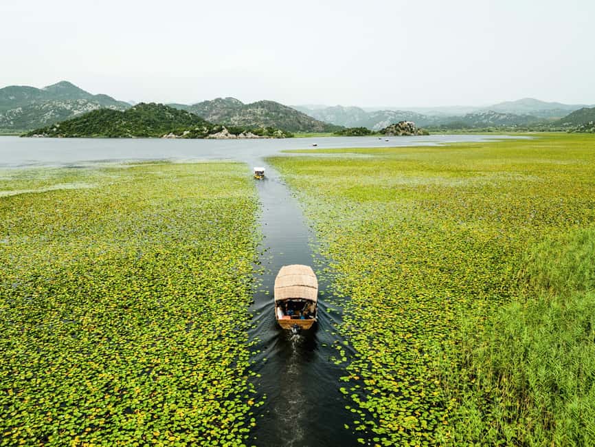 Skadar Lake National Park: Guided Boat Tour with Wooden Boat - Wine and a pause at Kamenik