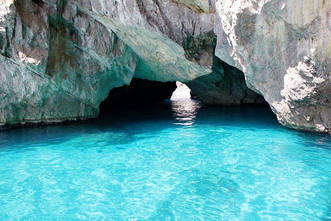 Small Group Capri Island Boat Ride with Swimming and Limoncello - The Faraglioni swim and onboard happy hour