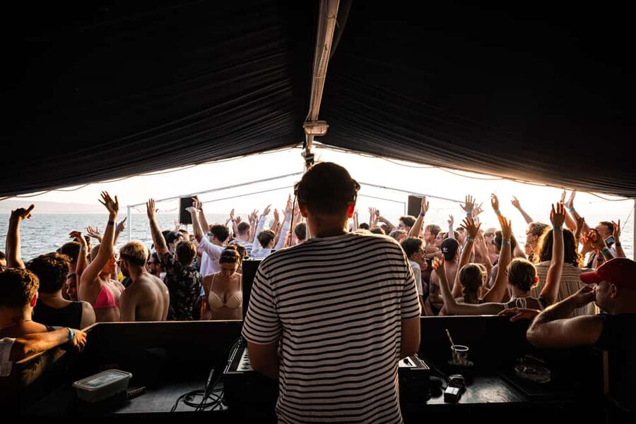 Split: Blue Lagoon Boat Party with DJs, Shots & After Party - Two decks, DJs, and a crowd of up to 300