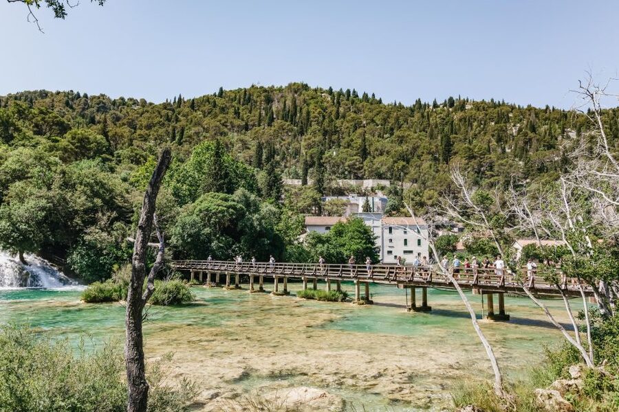 Split: Krka Waterfalls Trip with Boat Cruise and Swimming - Primošten gives the day a coastal finish