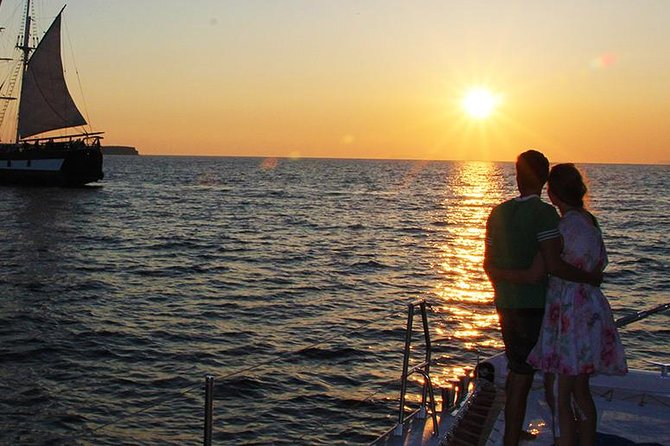 Sunset Sailing Catamaran Cruise in Santorini with BBQ and Drinks - Starting from Ammoudi or Athinios Port